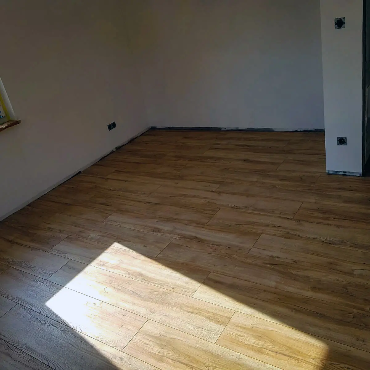 bodenbelaege-vinyl-laminat-wohnraum